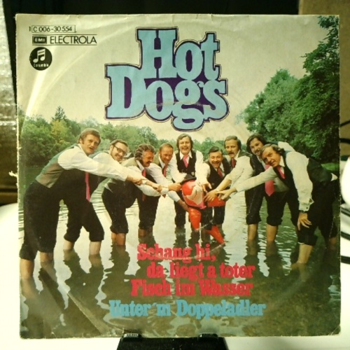 SINGLE / Hot Dogs – Schaug Hi, Da Liegt A Toter Fisch Im Wasser / Unter'm Doppeladler