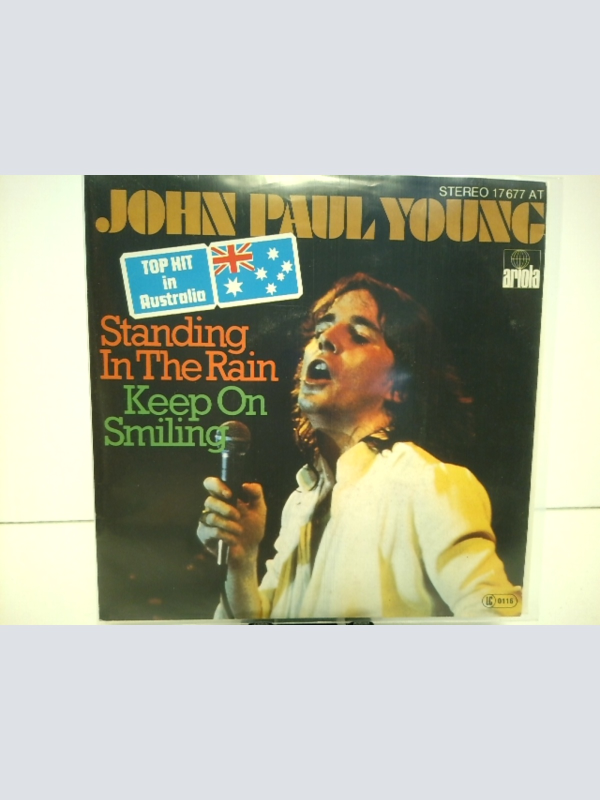 SINGLE / John Paul Young – Standing In The Rain / Keep On Smiling