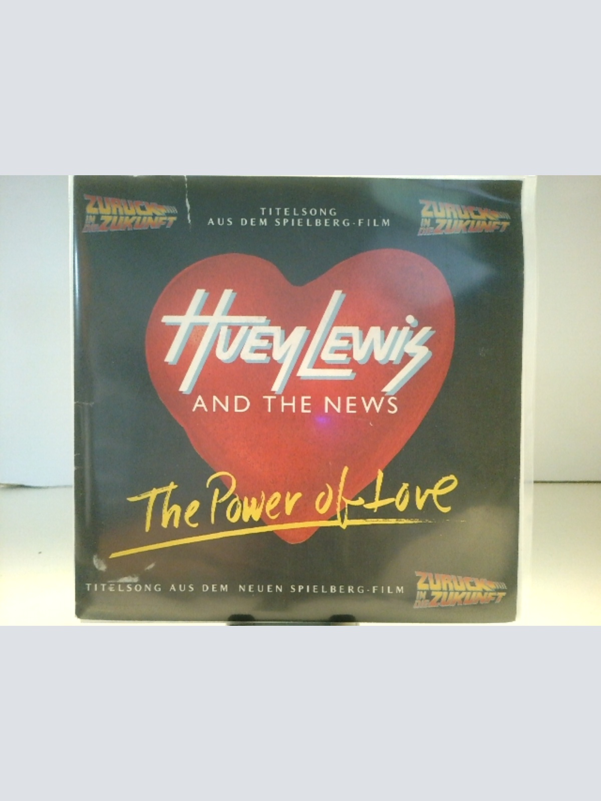 SINGLE / Huey Lewis And The News* – The Power Of Love