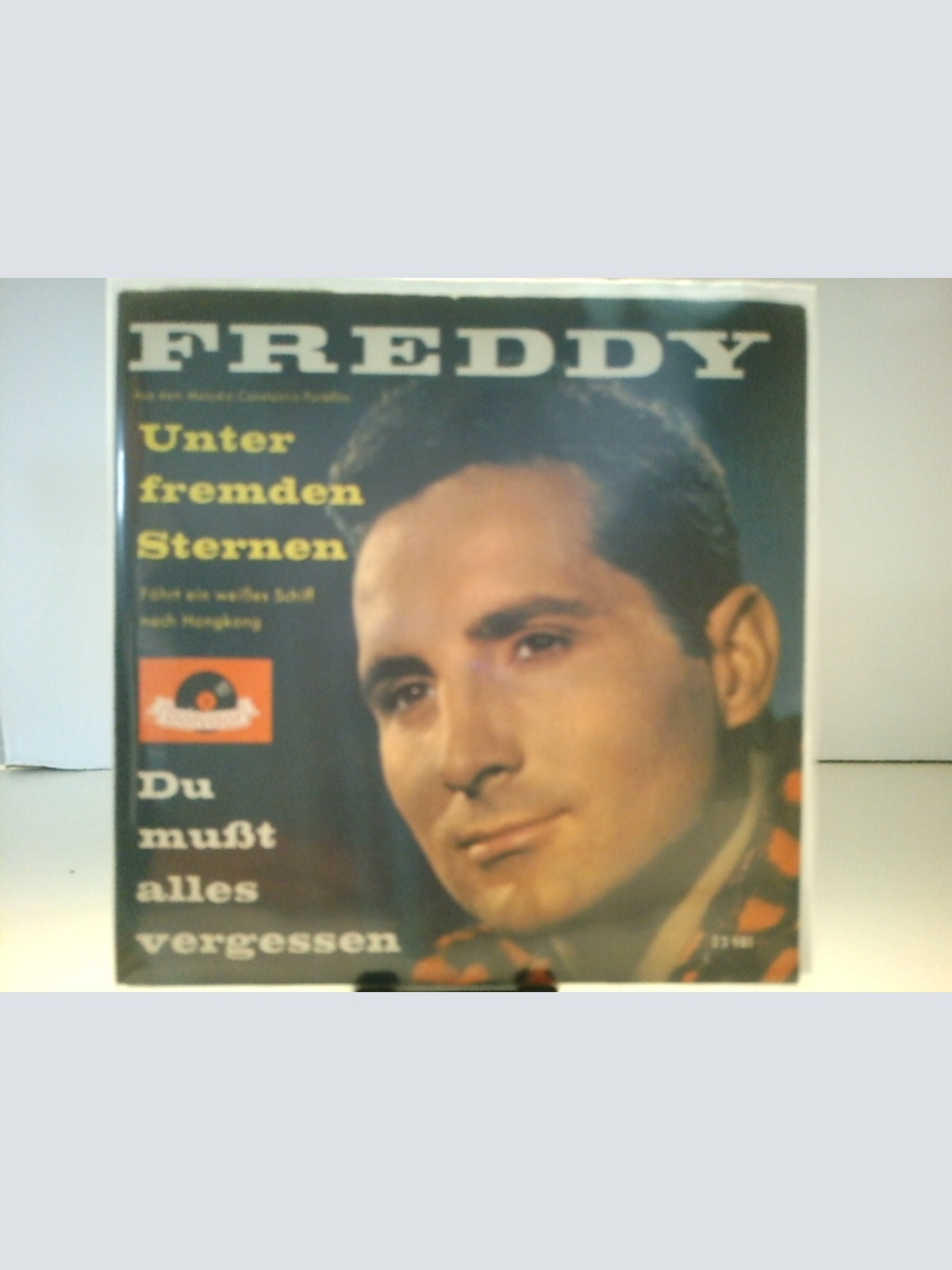 SINGLE / Freddy* – Unter Fremden Sternen / Du Mußt Alles Vergessen