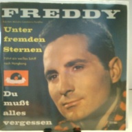 SINGLE / Freddy* – Unter Fremden Sternen / Du Mußt Alles Vergessen