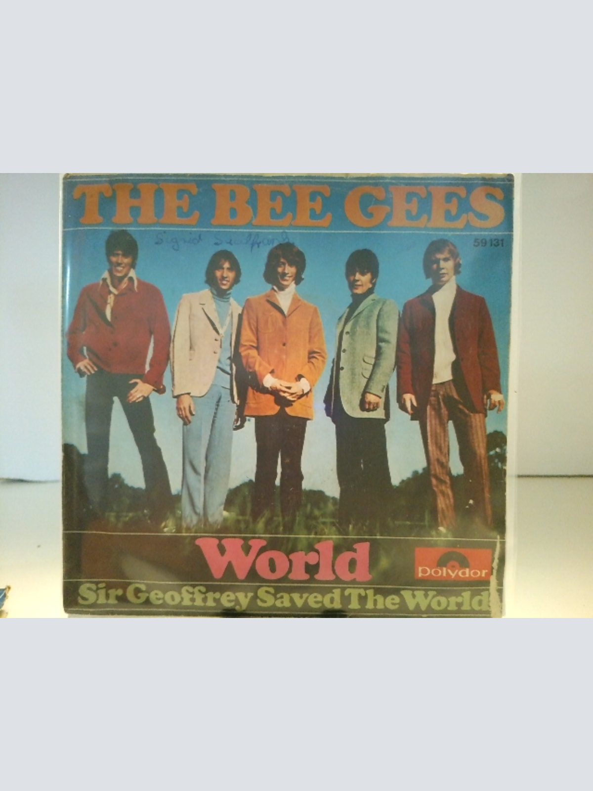 SINGLE / The Bee Gees* – World