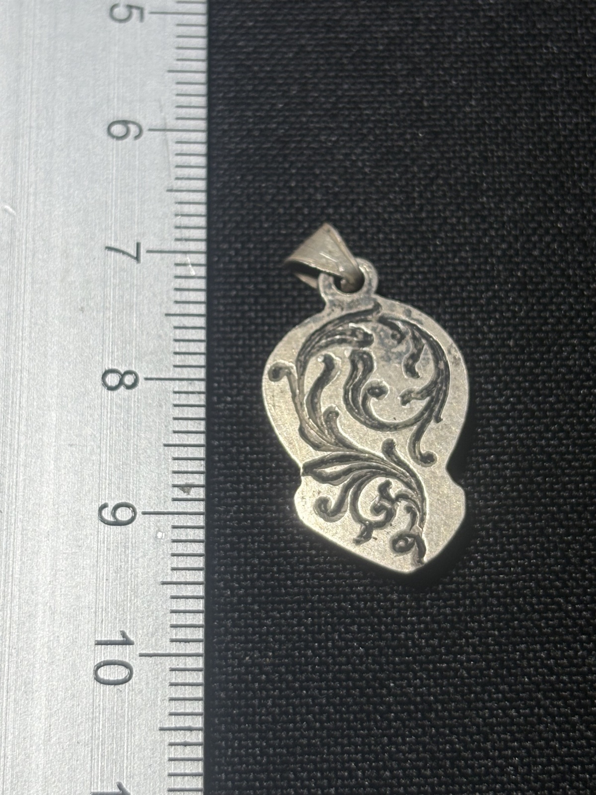 Silberamulett mit Jesus