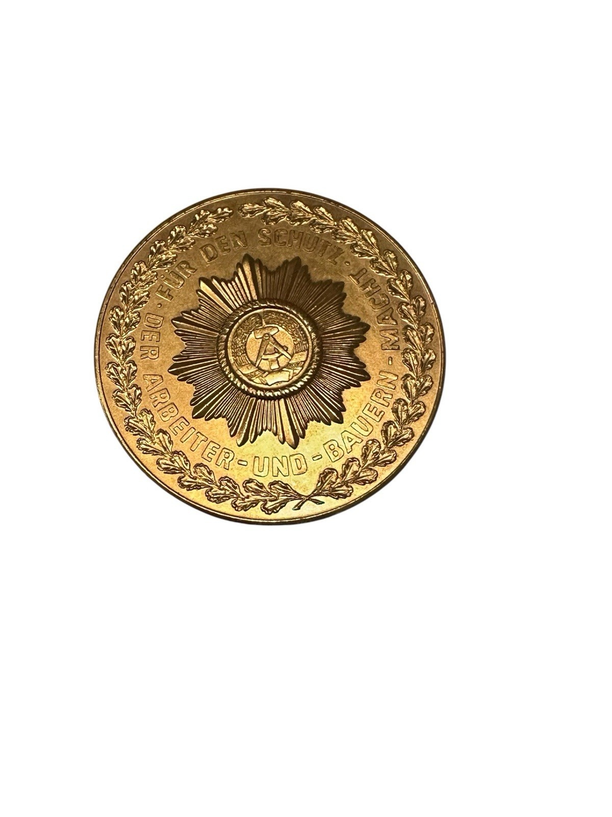 DDR Medaille für den Schutz der Arbeiter und Bauernmacht Goldfarben P7