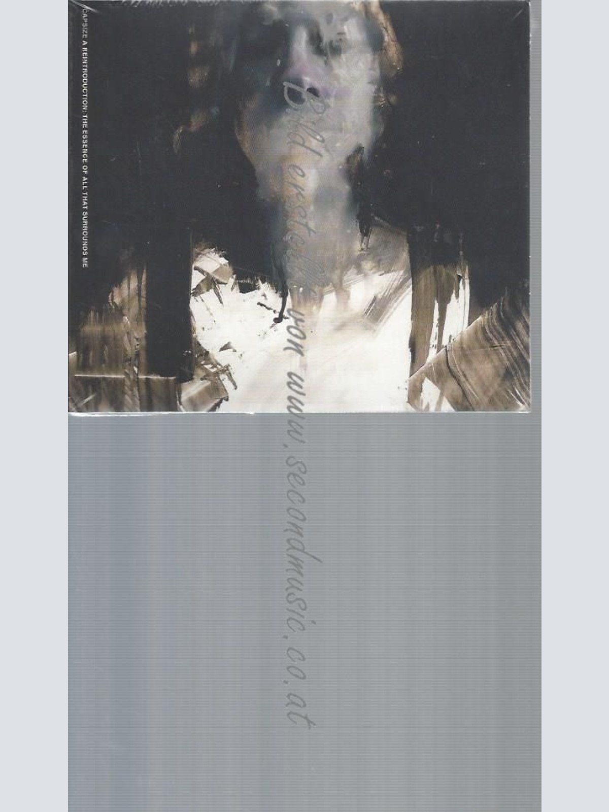 CD--CAPSIZE--A REINTRODUCTION: THE ESSENCE OF ALL THAT SURROUNDS ME