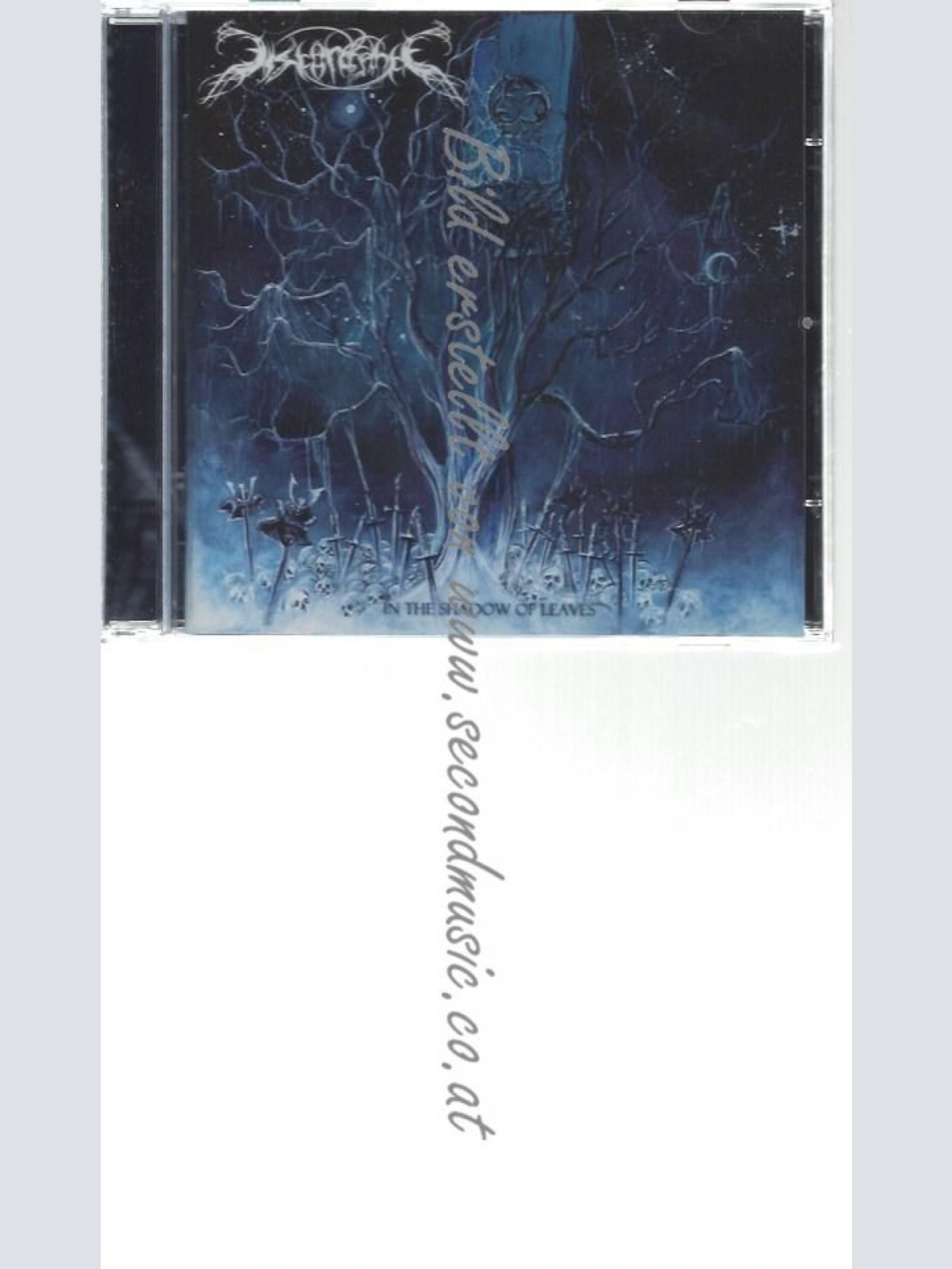 CD--DISCORDANCE--    IN THE SHADOW OF LEAVES |