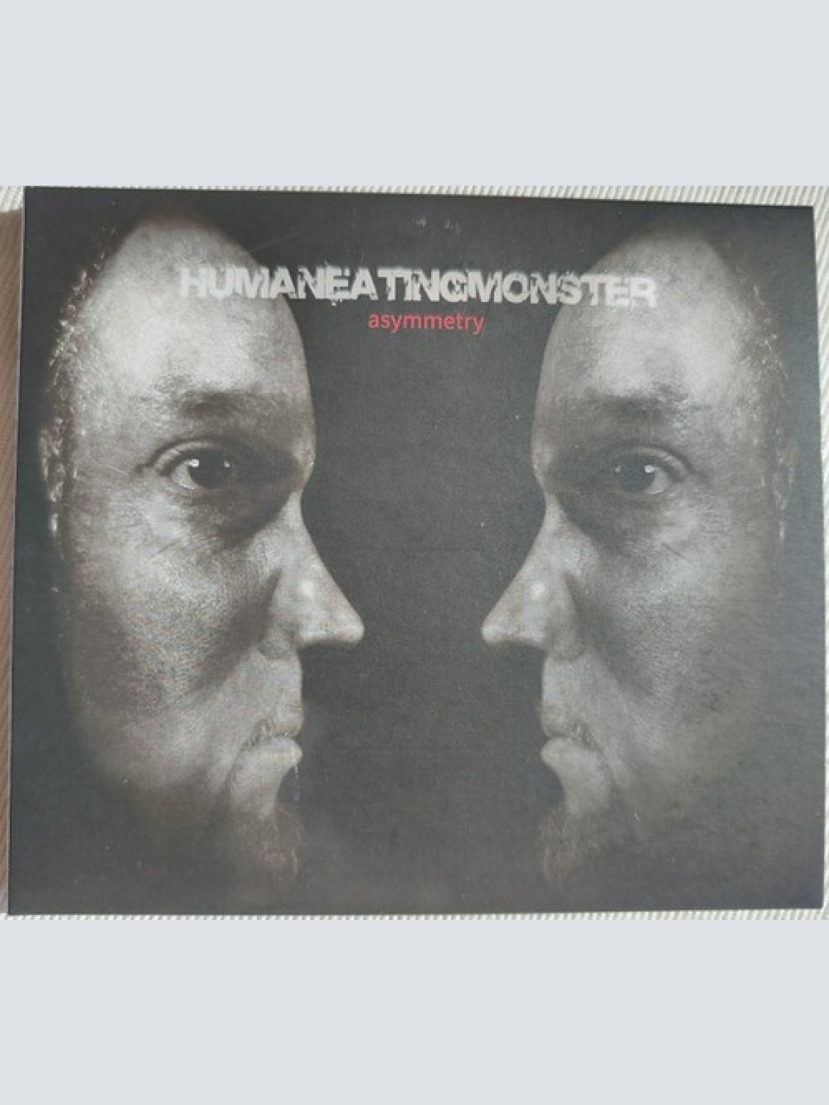Minimax, Album Human Eating Monster - asymmetry