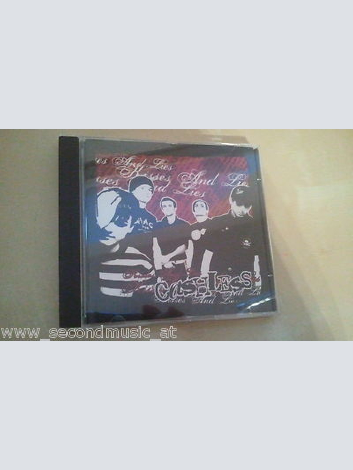 CD--CASHLESS--KISSES AND LIES-----ALBUM