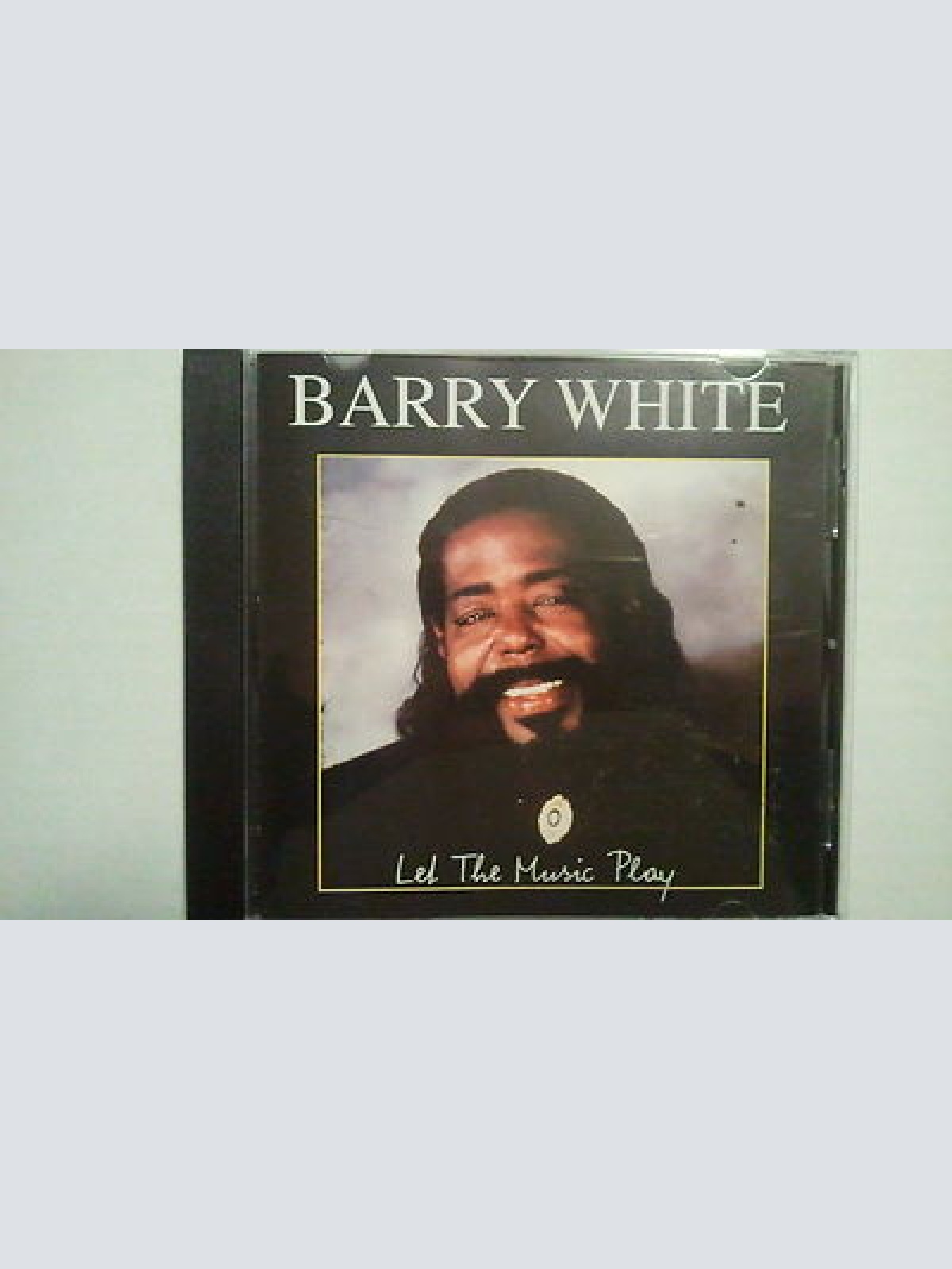 CD-BARRY WHITE - LET THE MUSIC PLAY  -- ALBUM