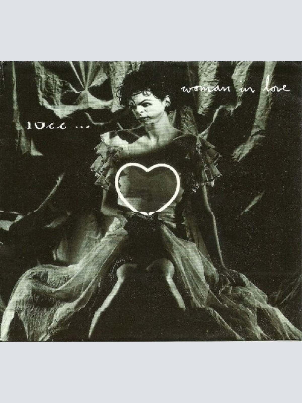 7", Single 10cc - Woman In Love