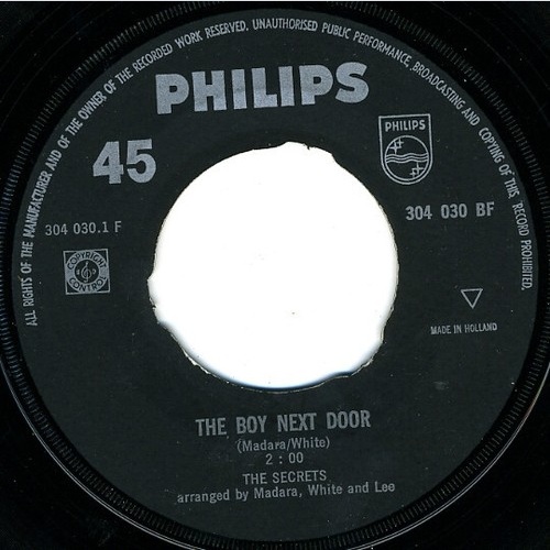 The Secrets (9) - The Boy Next Door (7", Single)